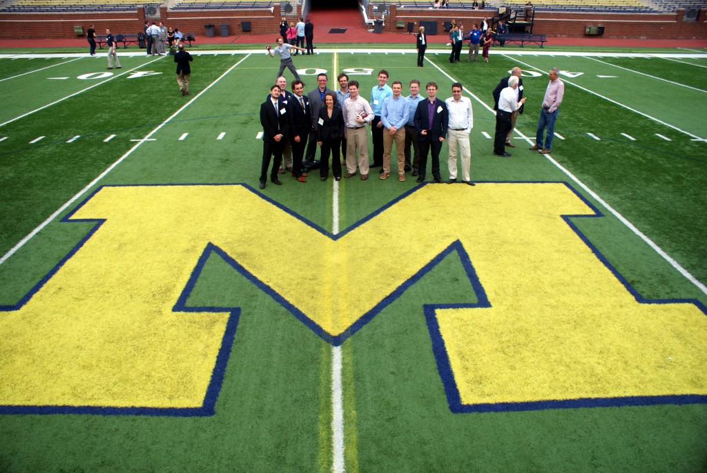 DNNG Members (From left to right) Alexis Poitrasson-Rivière, Steve Ward, Kyle Polack, Marek Flaska, Sara Pozzi, Chris Lawrence, Shaun Clarke, Marc Ruch, Michael Hamel, Cameron Miller, Mark Bourne and Marc Paff enjoy a tour of Michigan Stadium at the SORMA conference in June 2014.